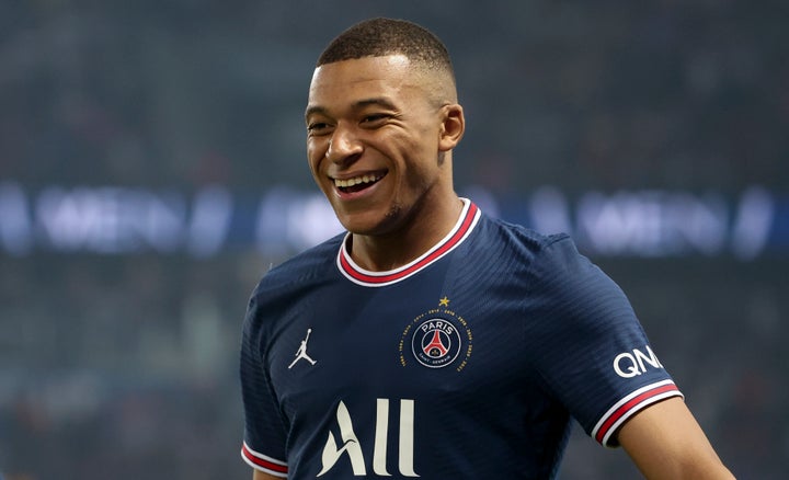 Mbappé, sonriente.