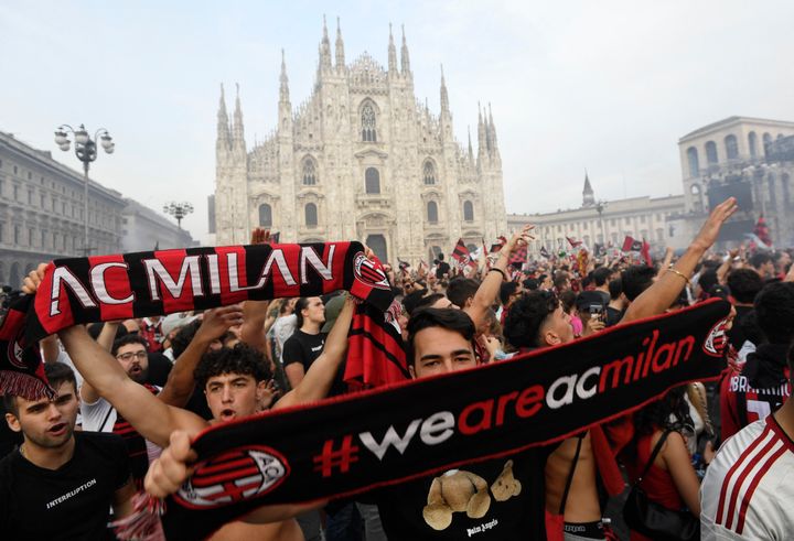 Soccer Football - AC Milan fans celebrate after winning the Serie A - Milan, Italy - May 22, 2022 AC Milan fans celebrate after winning the Serie A REUTERS/Flavio Lo Scalzo