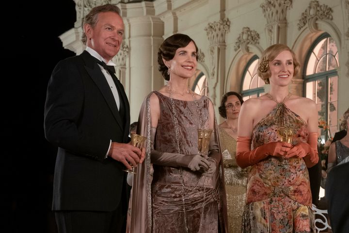 This image released by Focus Features shows Hugh Bonneville, from left, Elizabeth McGovern and Laura Carmichael in a scene from "Downton Abbey: A New Era." (Ben Blackall/Focus Features via AP)