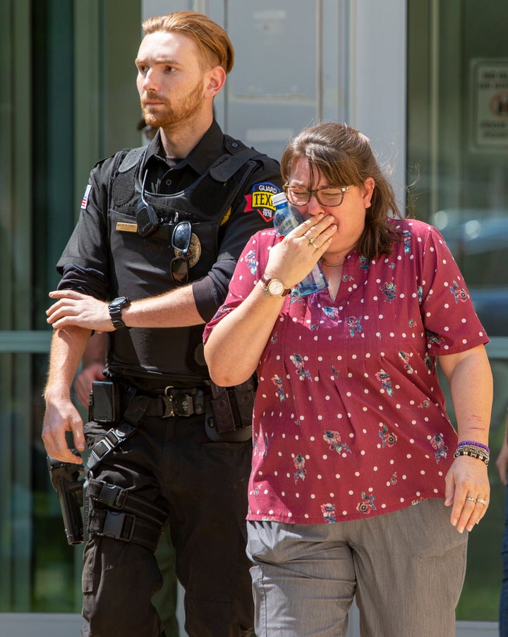 A woman cries as she leave the Uvalde Civic Center following a shooting earlier in the day at Robb Elementary School, on May 24, 2022, in Uvalde, Texas.
