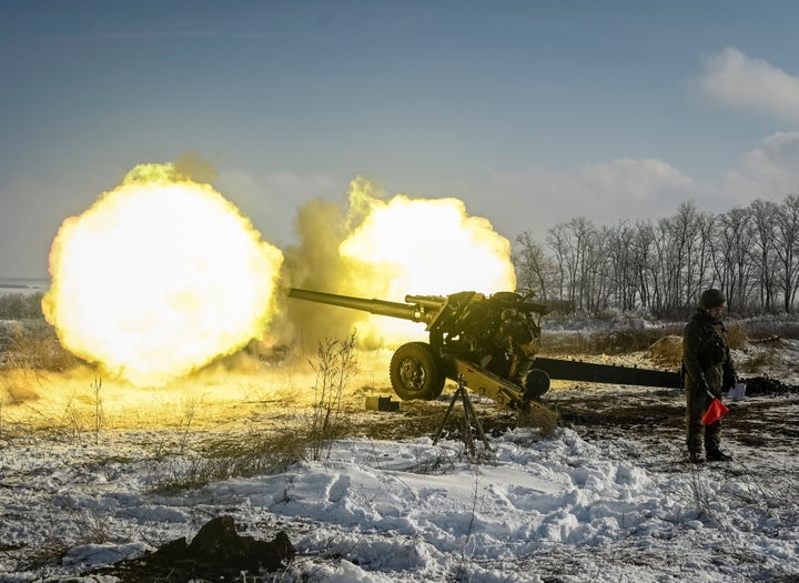 A Russian army service member fires a howitzer during drills at the Kuzminsky range in the southern Rostov region, Russia January 26, 2022. REUTERS/Sergey Pivovarov