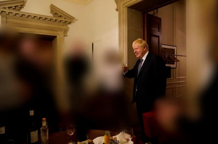 Boris Johnson raises a toast at Lee Cain's leaving do