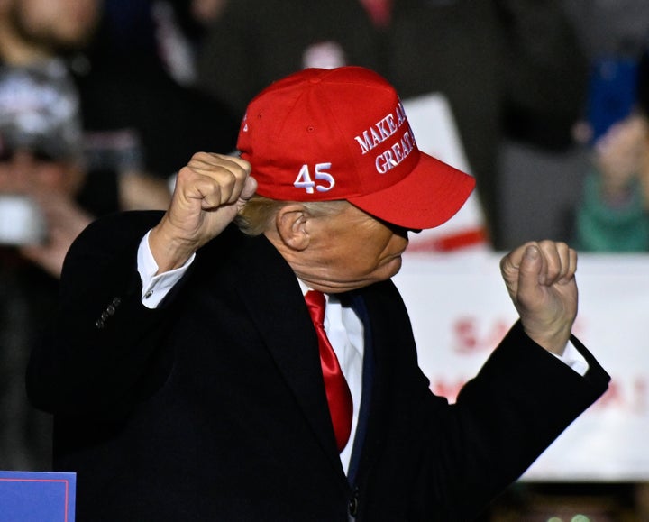 Former President Donald Trump appears at a rally Georgia candidates David Perdue, Burt Jones, Herschel Walker, Marjorie Taylor Greene and Vernon Jones in Commerce, Georgia, on March 26.