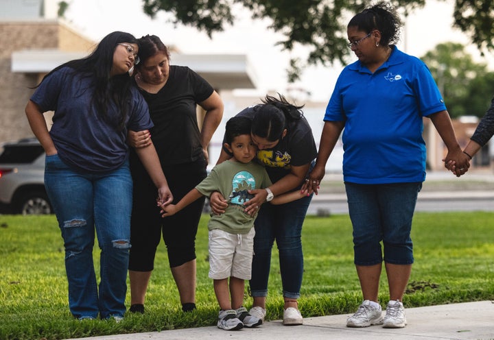 Members of the community gather at the City of Uvalde Town Square for a prayer vigil in the wake of a mass shooting at Robb Elementary School on May 24, 2022 in Uvalde, Texas.