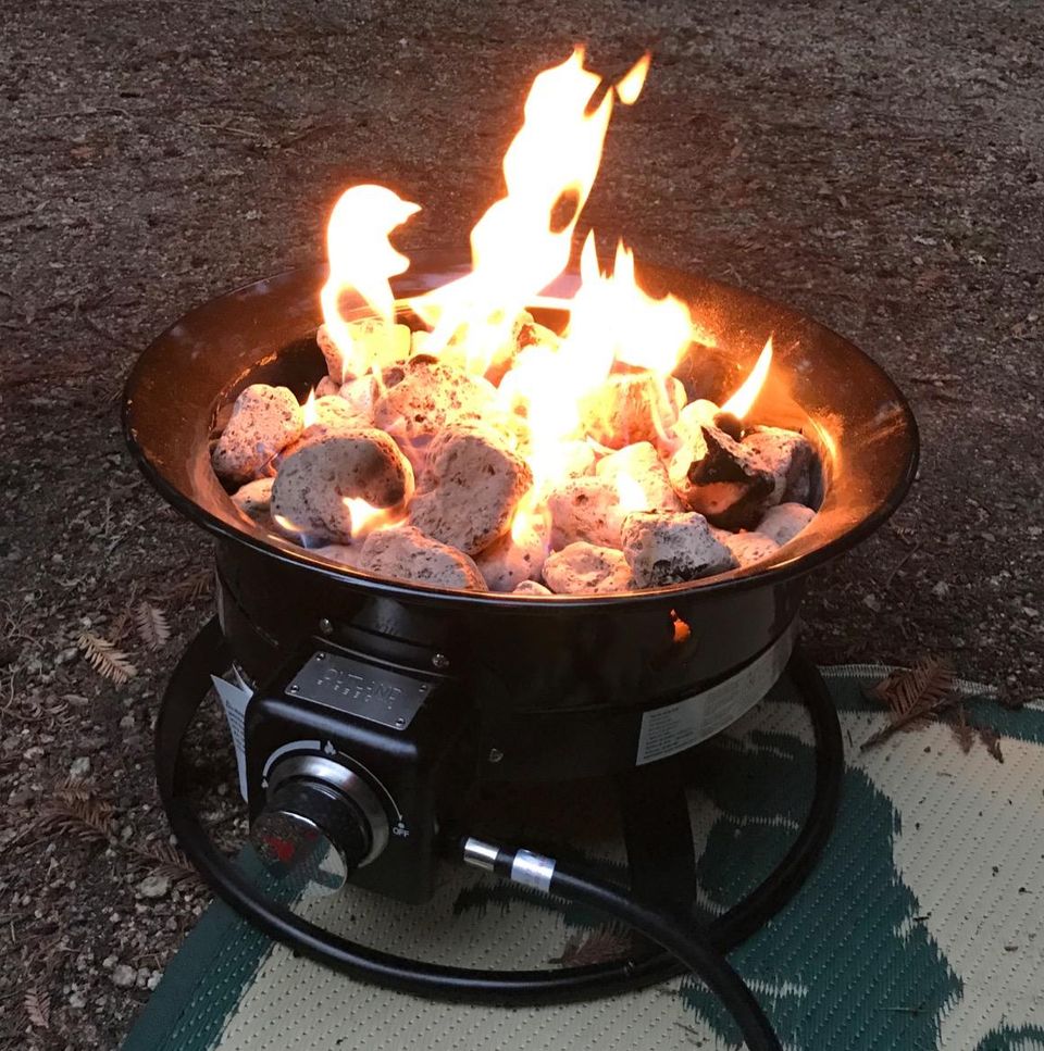 A lightweight and portable fire bowl complete with natural lava rocks