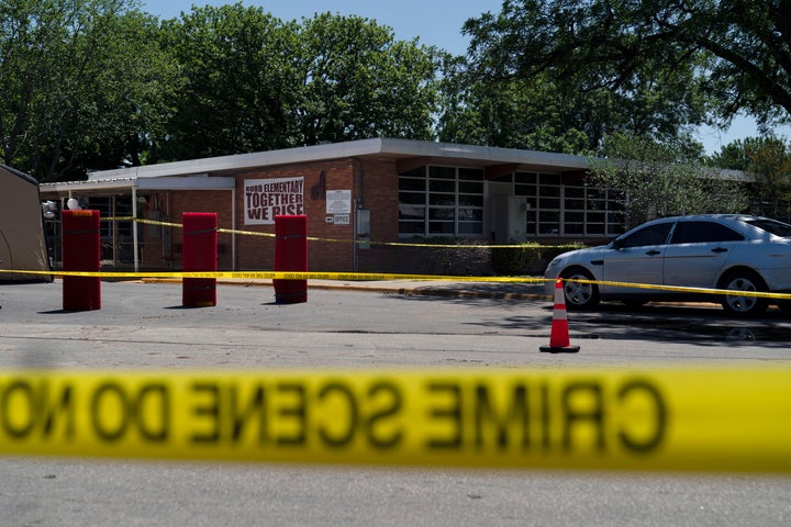 Crime scene tape surrounds Robb Elementary School in Uvalde, Texas, on May 25, 2022.