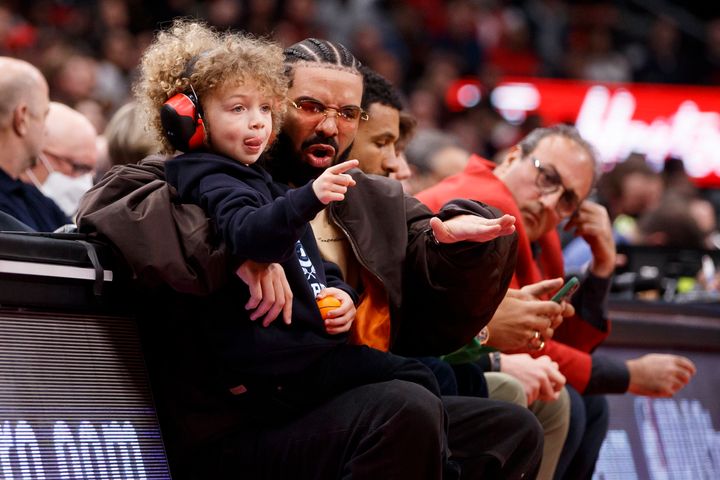 Drake and Adonis at a first-round NBA playoff game on April 28.