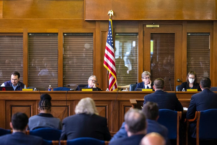 Michigan's Board of State Canvassers listens to comments from candidate Michael Markey Jr. during a Board of Canvassers meeting at the Senate hearing room inside Boji Tower in Lansing, Mich., on May 26, 2022.