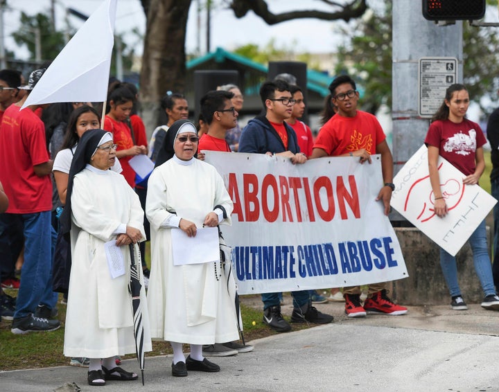 In this Jan. 22, 2017, photo, the Guam Catholic Pro-Life Committee holds its annual