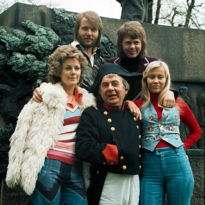 An actor playing Napoleon (center) poses with ABBA in 1974. Wow.