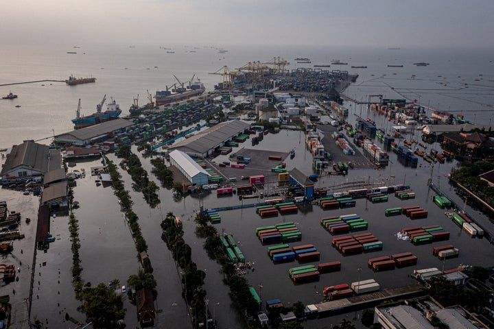 A general view of Tanjung Emas container port terminal flooded following high tides and broken seawalls in Semarang, Central Java province, Indonesia, May 23, 2022, in this photo by Antara Foto with a drone. Antara Foto/Aji Styawan/ via REUTERS ATTENTION EDITORS - THIS IMAGE HAS BEEN SUPPLIED BY A THIRD PARTY. MANDATORY CREDIT. INDONESIA OUT. NO COMMERCIAL OR EDITORIAL SALES IN INDONESIA.