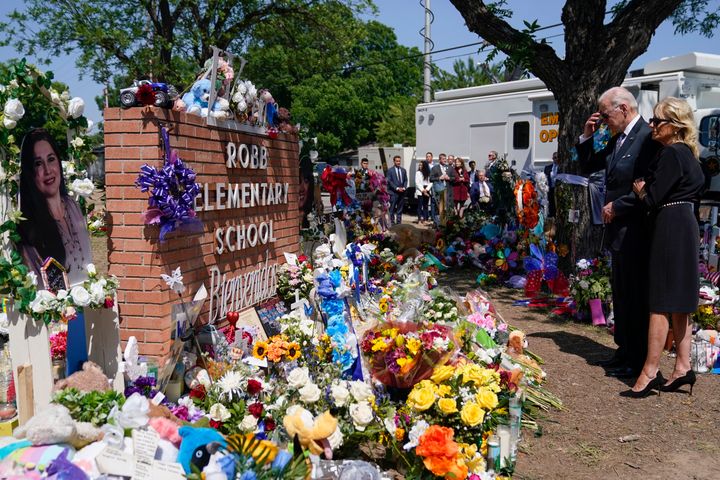 President Joe Biden and first lady Jill Biden visit Robb Elementary School to pay their respects to the victims of the mass shooting, Sunday, May 29, 2022, in Ulvade, Texas. (AP Photo/Evan Vucci)