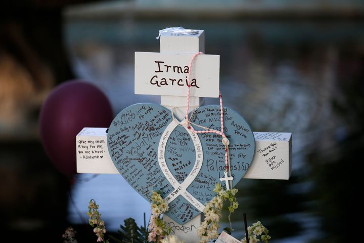 Irma Garcia's cross stands at a memorial site for the victims killed in the shooting at Robb Elementary School in Uvalde, Texas.