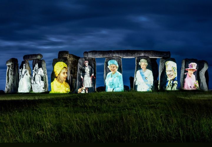 Stonehenge has been covered in the Queen's face from different decades of her reign to honour the Jubilee