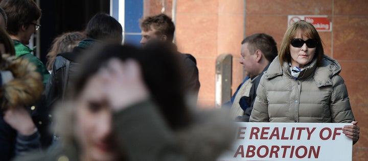 Pro Life campaigners stand outside the Marie Stopes Clinic on April 7, 2016 in Belfast, Northern Ireland.
