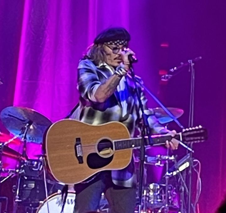 Johnny Depp stuns concert-goers in Sheffield by appearing on stage to perform alongside Jeff Beck. 