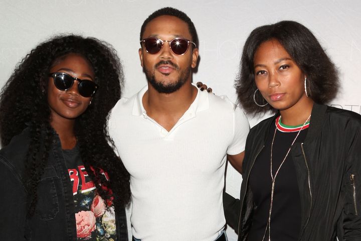 Romeo Miller (center) with his sisters Itali Miller (left) and Tytyana Miller (right) in 2018.