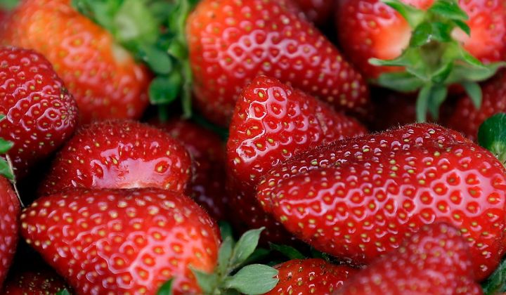 U.S. and Canadian regulators are investigating a hepatitis outbreak that may be linked to fresh organic strawberries. 