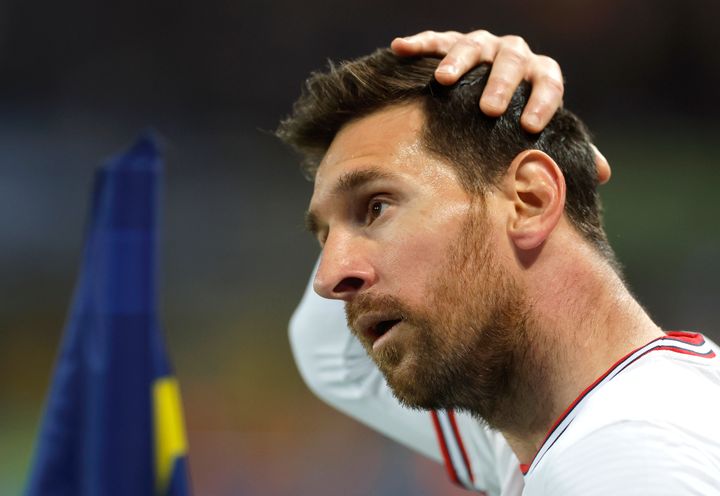 PSG's Lionel Messi reacts during the French League One soccer match between Strasbourg and Paris Saint-Germain at Stade de la Meinau stadium in Strasbourg, eastern France, Friday, April 29, 2022. (AP Photo/Jean-Francois Badias)