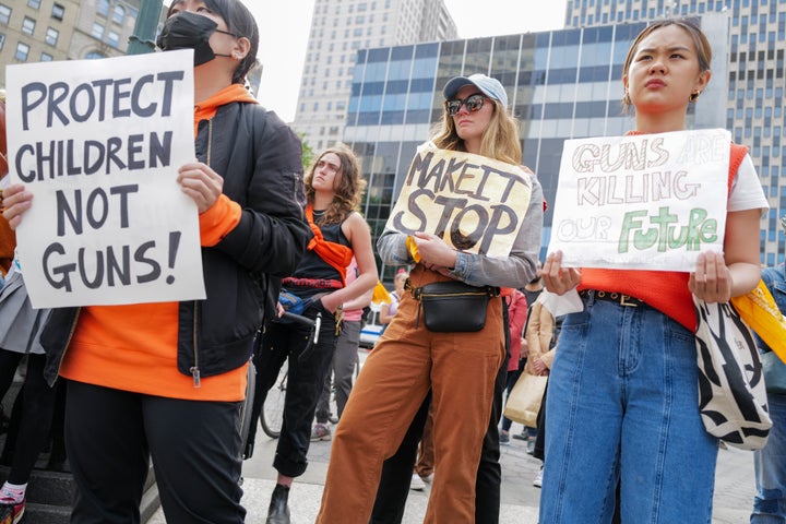 Gun rights activists, including the group Youth Over Guns, participate in a rally in New York City's Foley Square to demand an end to gun violence on May 26, 2022.