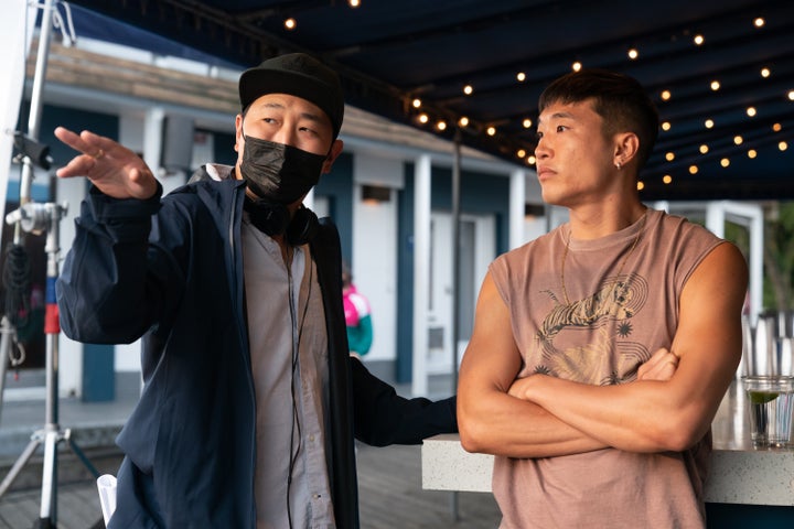 Director Andrew Ahn and writer and star Joel Kim Booster on the set of "Fire Island."