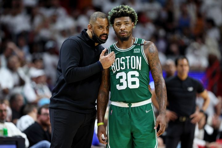 Boston Celtics head coach Ime Udoka, pictured talking with Marcus Smart, led the team to the NBA Finals in his first season at the helm. 