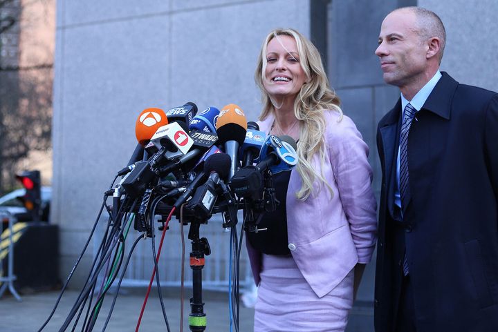 Stephanie Clifford, known as Stormy Daniels in the adult film industry, is interviewed alongside her former lawyer Michael Avenatti as she leaves Manhattan Federal Court on April 16, 2018, in New York.