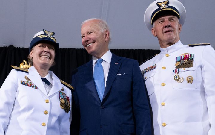 US President Joe Biden, Admiral Karl Schultz and Admiral Linda Fagan participate in the US Coast Guard (USCG) change of command ceremony at USCG Headquarters in Washington, DC, on June 1, 2022. - Schultz is relieved by Fagan as the 27th commandant of the USCG and first woman to hold the position. (Photo by SAUL LOEB / AFP) (Photo by SAUL LOEB/AFP via Getty Images)