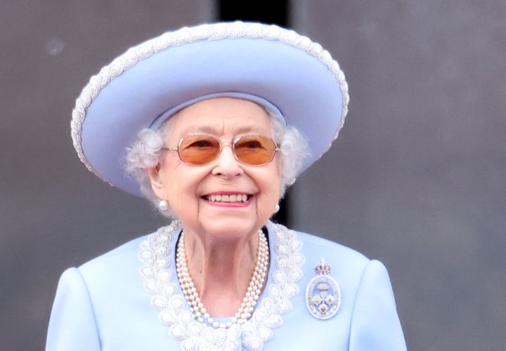Queen Elizabeth smiles on the balcony during Trooping the Colour on June 2.