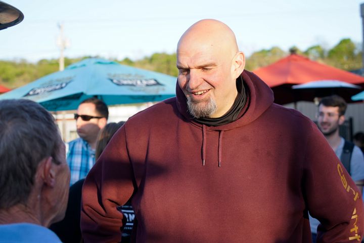 Pennsylvania Lt. Gov. John Fetterman greets people at a campaign stop in Greensburg on May 10. He is due to face Republican Mehmet Oz in the general election.