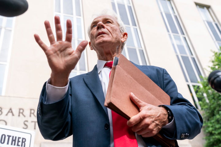 Former Trump White House official Peter Navarro speaks to reporters on Friday, June 3, 2022, outside of federal court in Washington. Navarro was indicted Friday on contempt charges after defying a subpoena from the House panel investigating the Jan. 6 attack on the U.S. Capitol. (AP Photo/Jacquelyn Martin)