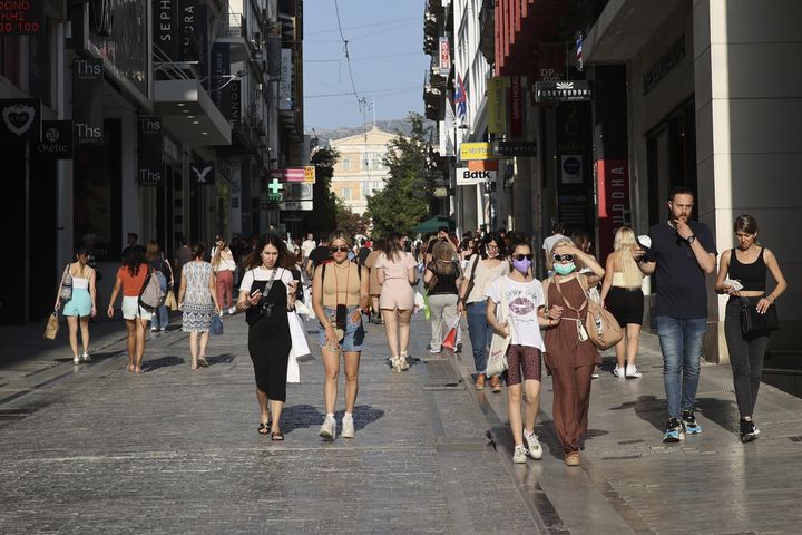 ATHENS, GREECE - MAY 31: People are seen at the Ermou Street after the lifting of coronavirus measures in Athens, Greece on May 31, 2022. (Photo by Ayhan Mehmet/Anadolu Agency via Getty Images)