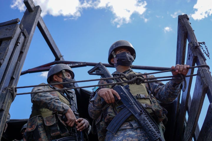 Soldiers arrive near Chiquix village, where 13 people were killed, in Nahuala, Guatemala, on December 19, 2021. - At least 13 people died in western Guatemala, including women, children and a police officer, due to an old conflict over land between indigenous villages, the Police reported on Saturday December 18. (Photo by Johan ORDONEZ / AFP) (Photo by JOHAN ORDONEZ/AFP via Getty Images)