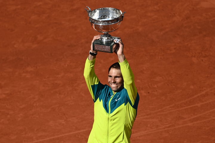 Spain's Rafael Nadal poses with The Musketeers' Cup as he celebrates after victory over Norway's Casper Ruud during their men's singles final match on day fifteen of the Roland-Garros Open tennis tournament on Sunday.