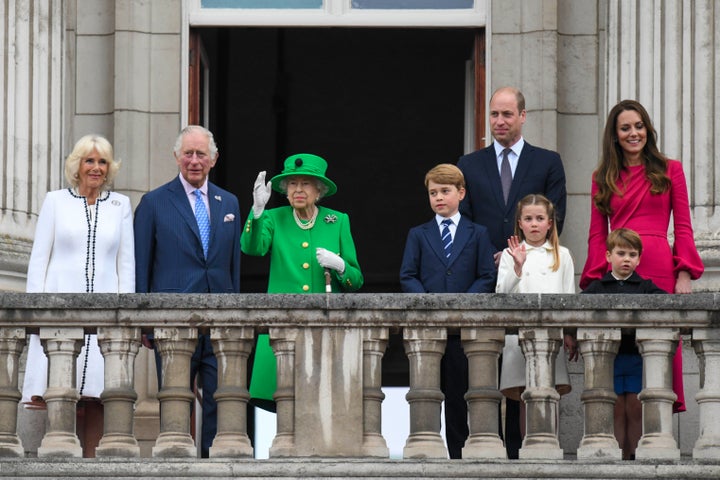 From left, Camilla, Duchess of Cornwall Prince Charles, Queen Elizabeth II, Prince George, Prince William, Princess Charlotte, Prince Louis and Kate, Duchess of Cambridge stand on the balcony, at the end of the Platinum Jubilee Pageant held outside Buckingham Palace, in London, Sunday June 5, 2022, on the last of four days of celebrations to mark the Platinum Jubilee. The pageant will be a carnival procession up The Mall featuring giant puppets and celebrities that will depict key moments from Queen Elizabeth II’s seven decades on the throne. (Roland Hoskins/Pool Photo via AP)