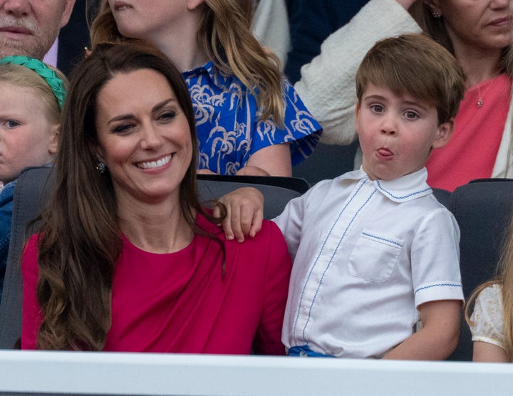 Prince Louis seemed to get a little bored of the festivities, resorting to entertaining himself as he watched with his family.