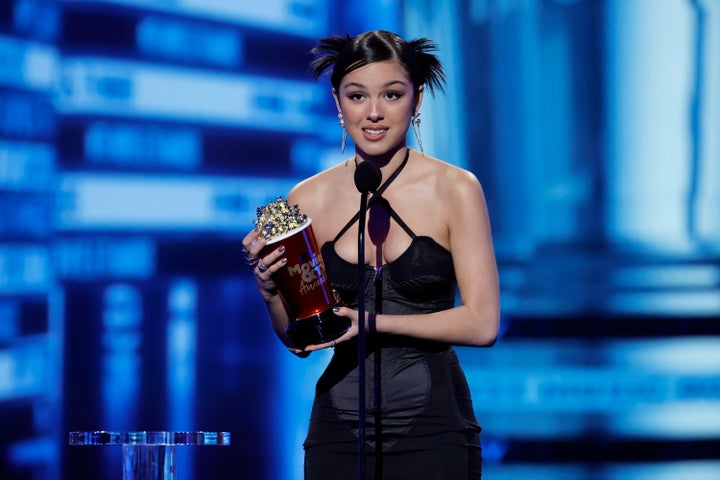 Olivia Rodrigo accepts the Best Music Documentary award for ‘driving home 2 u (a SOUR film) during the 2022 MTV Movie & TV Awards.