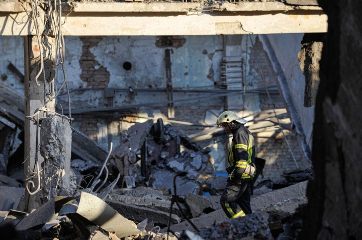 The fireman is seen in the destroyed production shop of the Darnytskyi freight cars repair plant demolished by a missile attack by the Russian army on June 5, 2022. Russian aircraft fired missiles at Darnytskyi and Dniprovskyi districts in Kyiv, Ukraine.