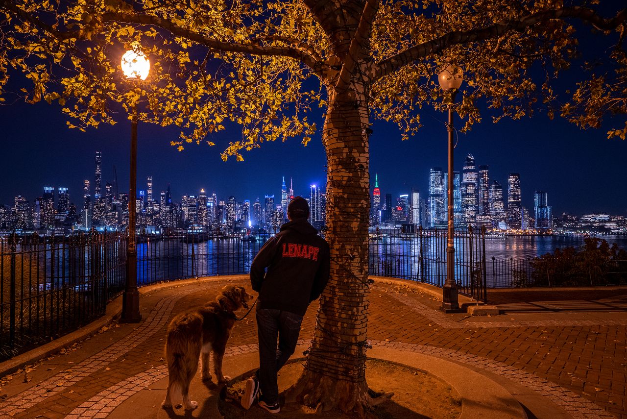 The author and his dog, Oli, take in the view of Manhattan from Weehawken, New Jersey.