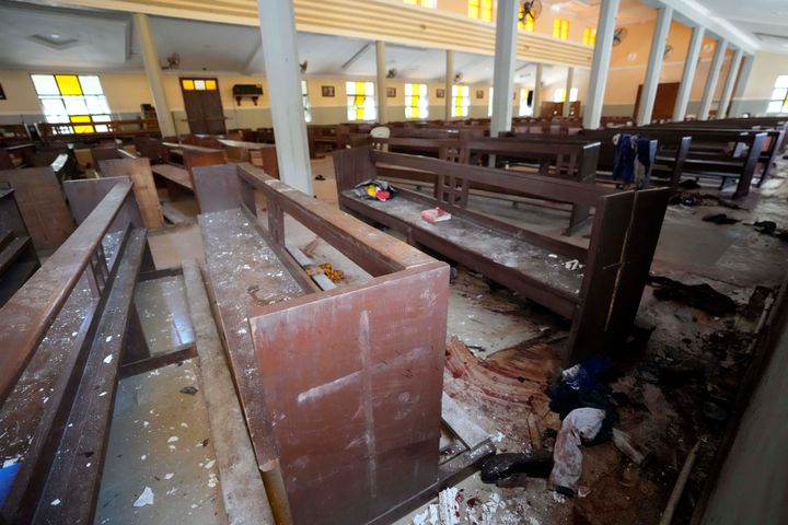 Personal belongings and shoes lie on the ground of St. Francis Catholic Church in Owo, Nigeria, Monday, June 6, 2022, a day after an attack that targeted worshipers.