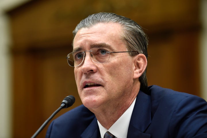 U.S. Special Representative for Afghanistan and Pakistan Richard Olson testifies on Capitol Hill in Washington on Dec. 16, 2015. Olson, who has signed a plea deal with prosecutors in January, is pushing federal prosecutors explain why he’s facing criminal charges for illegal foreign lobbying on behalf of Qatar while a retired four-star general who worked with him on the effort is not.