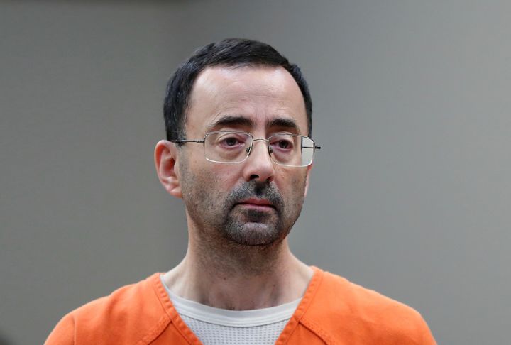 Dr. Larry Nassar appears in court for a plea hearing on Nov. 22, 2017, in Lansing, Mich. The U.S. Justice Department said May 26, 2022 it will not pursue criminal charges against former FBI agents who failed to quickly open an investigation of sports doctor Larry Nassar despite learning in 2015 that he was accused of sexually assaulting female gymnasts.