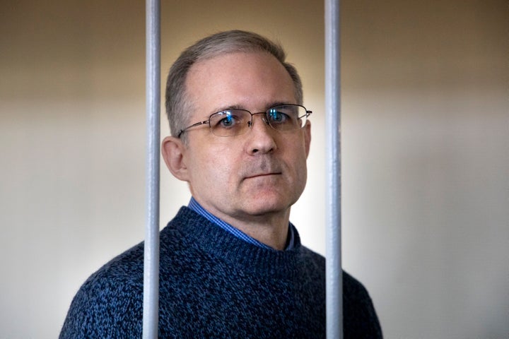 In this Aug. 23, 2019, file photo, Paul Whelan, a former U.S. marine who was arrested for alleged spying in Moscow on Dec. 28, 2018, stands in a cage as he waits for a hearing in a court room in Moscow.