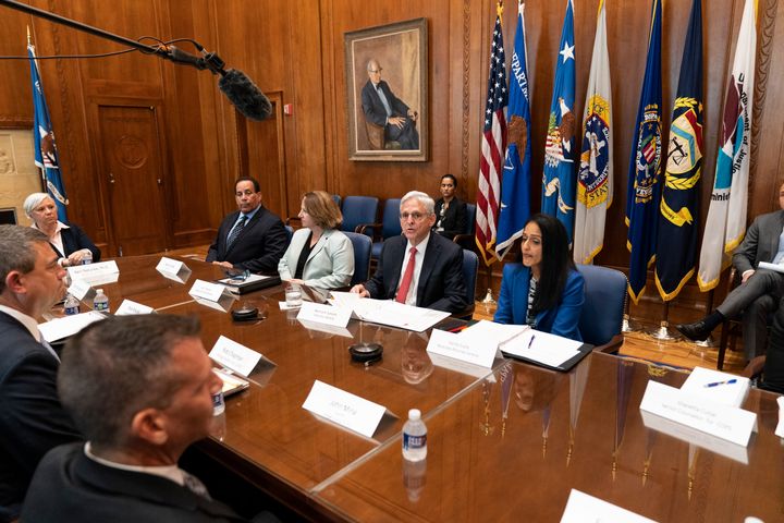 Attorney General Merrick Garland, third from left, speaks to announce a team to conduct a critical incident review of the shooting in Uvalde, Texas, on Wednesday.