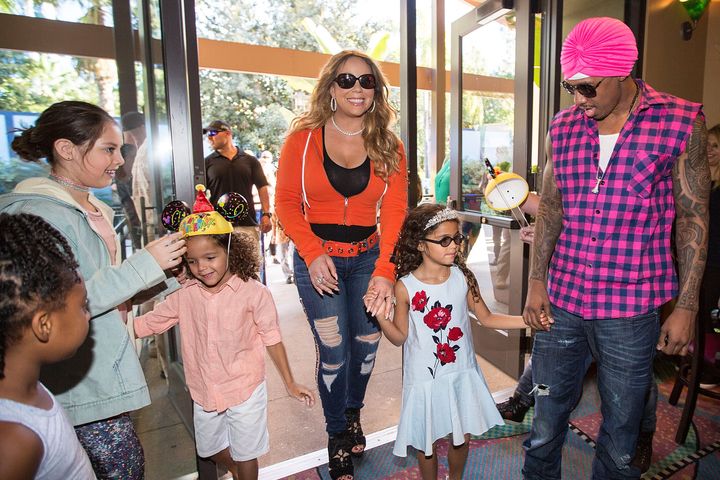 Mariah Carey and Nick Cannon arrive at their twins' birthday party at Disneyland in April 2017.