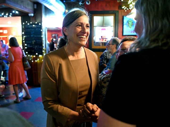Monica Tranel talks with a supporter during an election watch event in Missoula, Montana, on Tuesday. Tranel defeated Cora Neumann and state Rep. Tom Winter in Tuesday’s primary.
