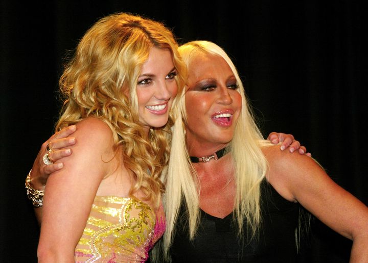 Donatella Versace and Britney Spears pictured at Versace's Spring/Summer women's 2003 collection 