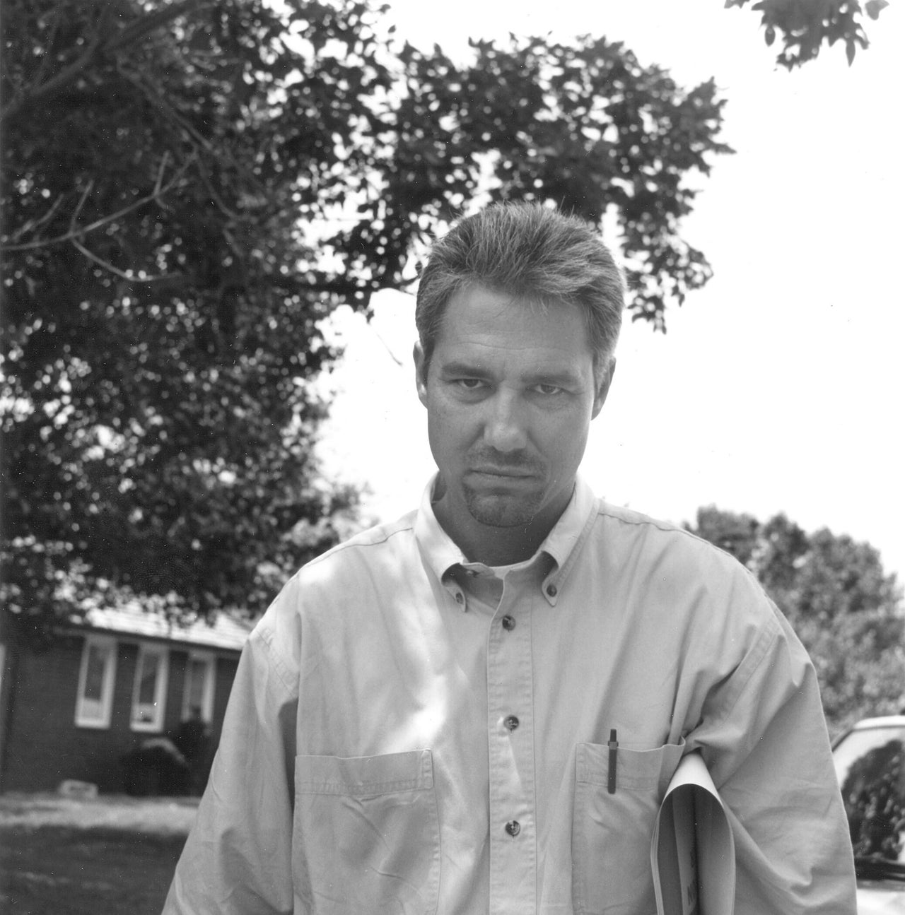 Troy Newman leads a prayer outside the private residence of an abortion clinic's staff member in Wichita, Kansas. In an attempt to close the clinic, Operation Rescue West activists identified workers at the clinic and held prayer vigils and protests at their homes. 