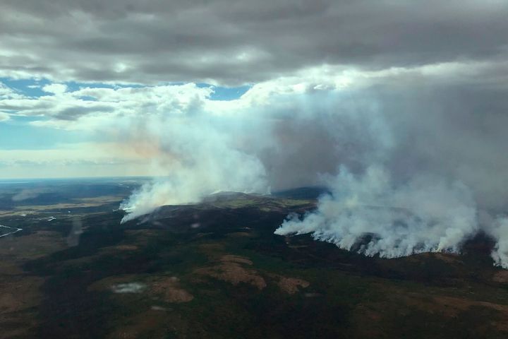 In this aerial photo provided by the BLM Alaska Fire Service, the east side of the East Fork Fire is seen near St. Mary's, Alaska, on June 9, 2022. 