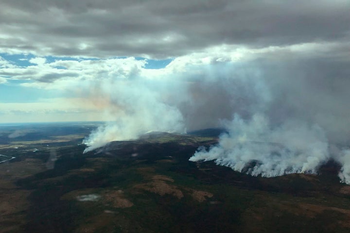 Tundra fire threatens villages through southwest alaska In this aerial photo provided by blm alaska fire service, the east side of the east fork fire is seen near st. Mary's, alaska on june 9, 2022.
